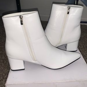 Boutique style white booties
